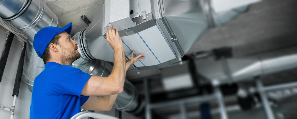 Installation and Repair Service for Ventilation System. HVAC Technician at Work in New Orleans