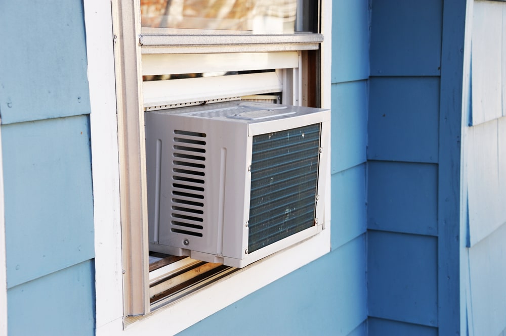 Traditional window-mounted air conditioner, exemplifying convenient and flexible cooling solutions for small spaces in New Orleans.